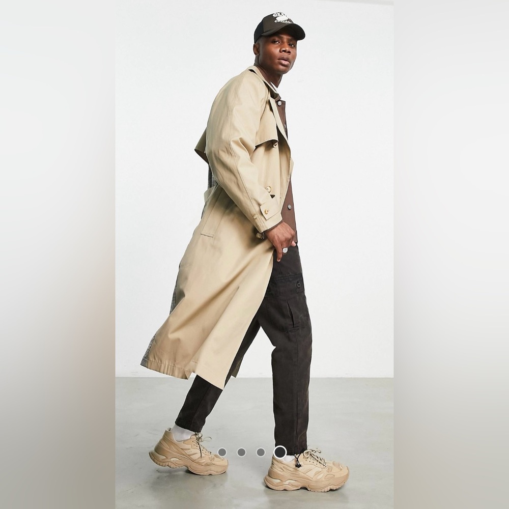 Oversized trench in stone with check panels